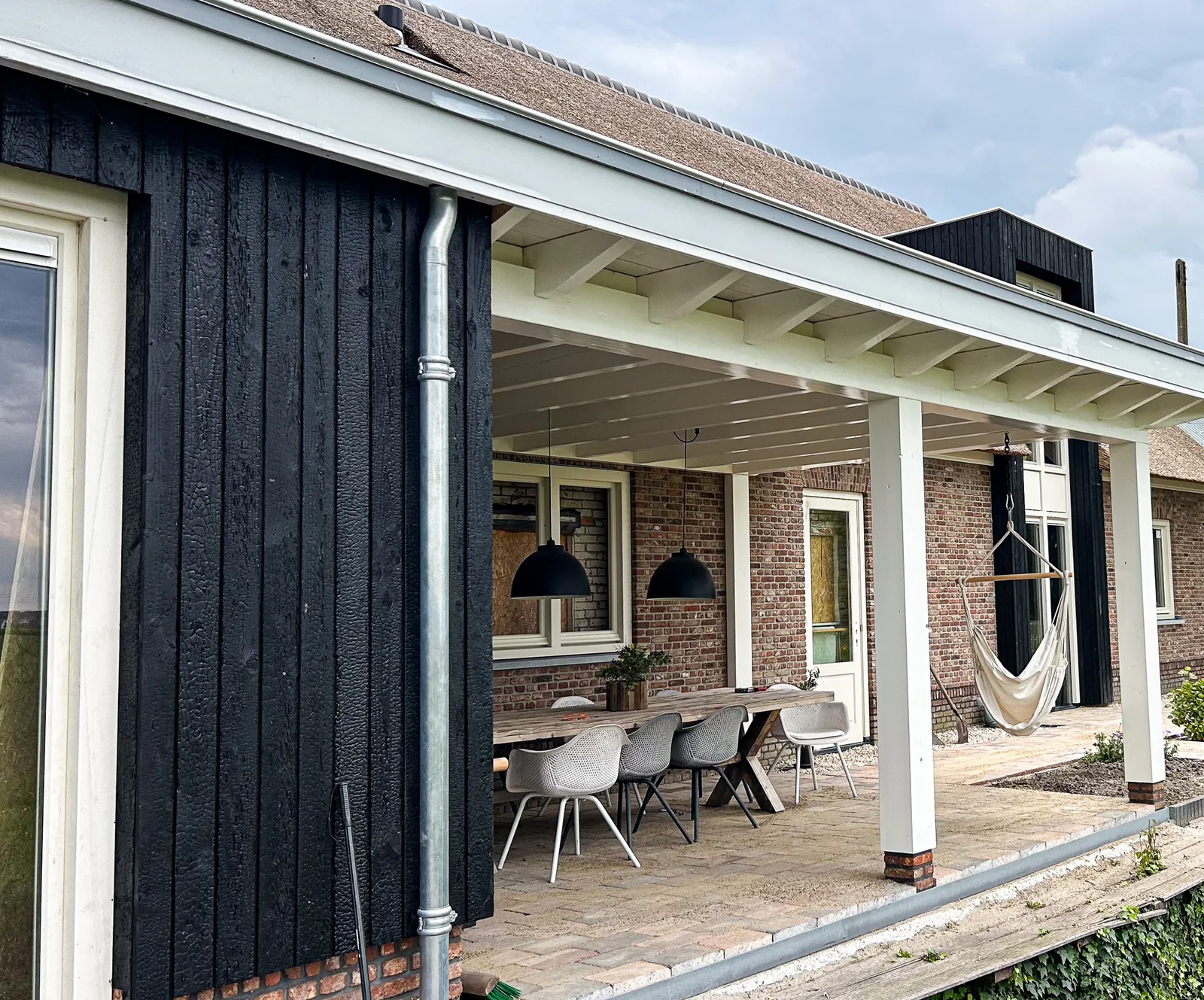 Black Shou Sugi Ban cladding on a completed residential facade and covered terrace