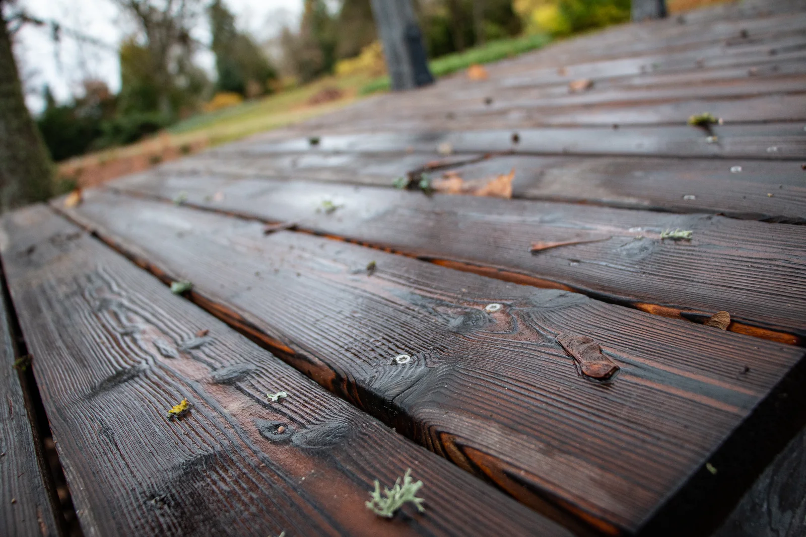 Completed outdoor terrace made with dark charred timber decking boards